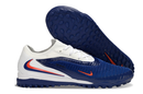 Chuteira Nike Phantom GX Elite Society TF