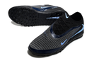 Chuteira Nike Phantom GX Elite Society TF