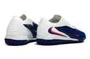 Chuteira Nike Phantom GX Elite Society TF