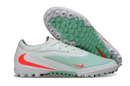 Chuteira Nike Phantom GX Trava MG