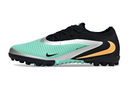 Chuteira Nike Phantom GX Trava MG