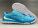 Chuteira Nike Phantom GX Elite Society TF