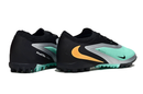 Chuteira Nike Phantom GX Trava MG