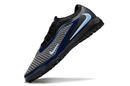 Chuteira Nike Phantom GX Elite Society TF